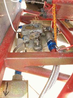 You can see the carb temperature probe at the left, with the white wires coming off it.  Also barely visible at right the fuel pressure sensor adapter and VDO sensor between the steel braided hose and the fuel inlet on the carb. IMG_0430.jpg